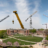 North-facing photo from the Nebraska Union showing multiple cranes scattered across campus.